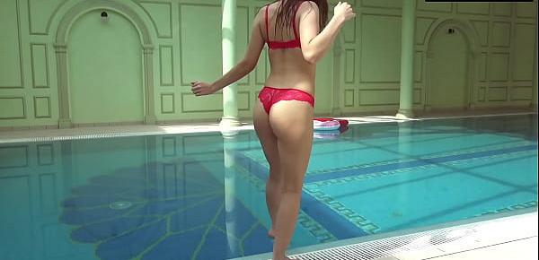  Brunette big tits babe Mia Ferrari swims in the pool